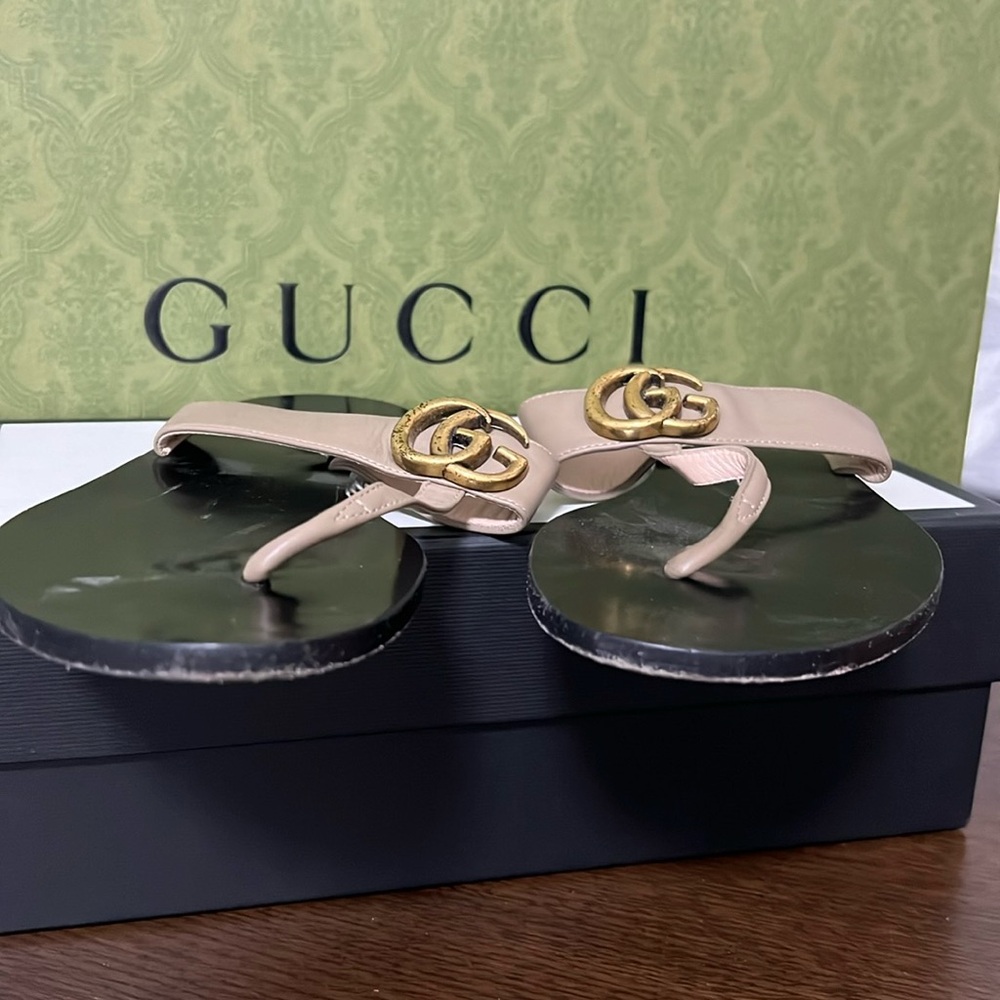 Tan color flat Gucci sandals size 38
